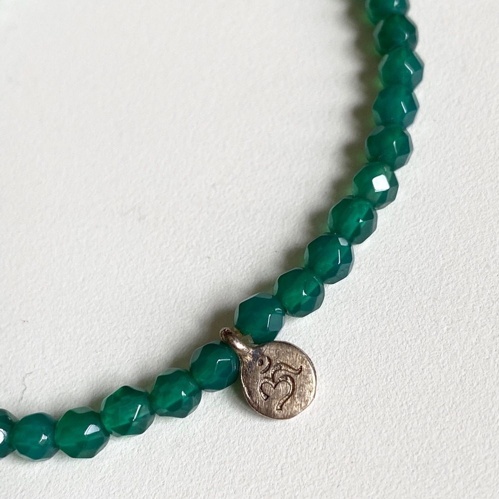 Satya stretch bracelet, like new. Green Onyx OM